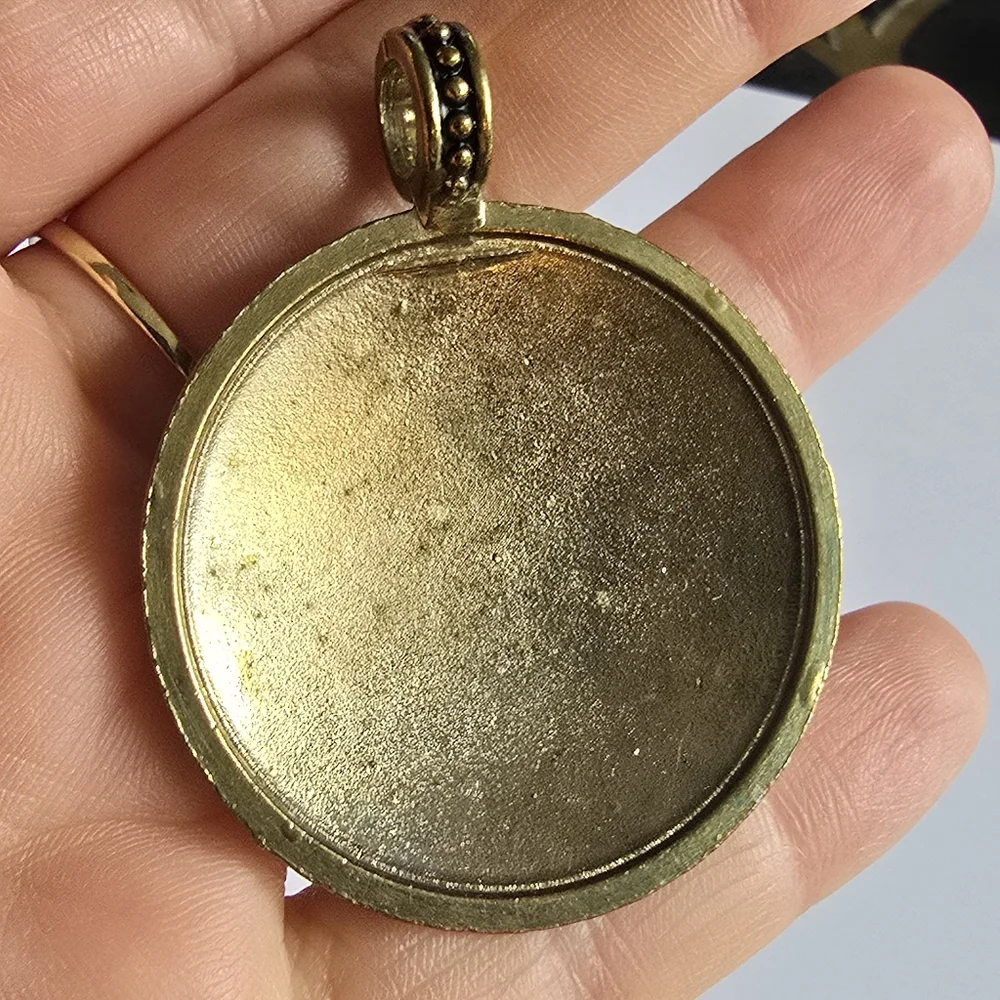 Spiral pendant gold tone domed circle big bold boho